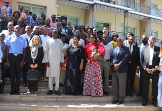 UNFPA representative with UNFPA staff, United Nations System and partners